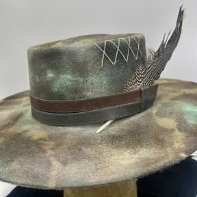 Bolero hat with custom stitching, color and statement feather